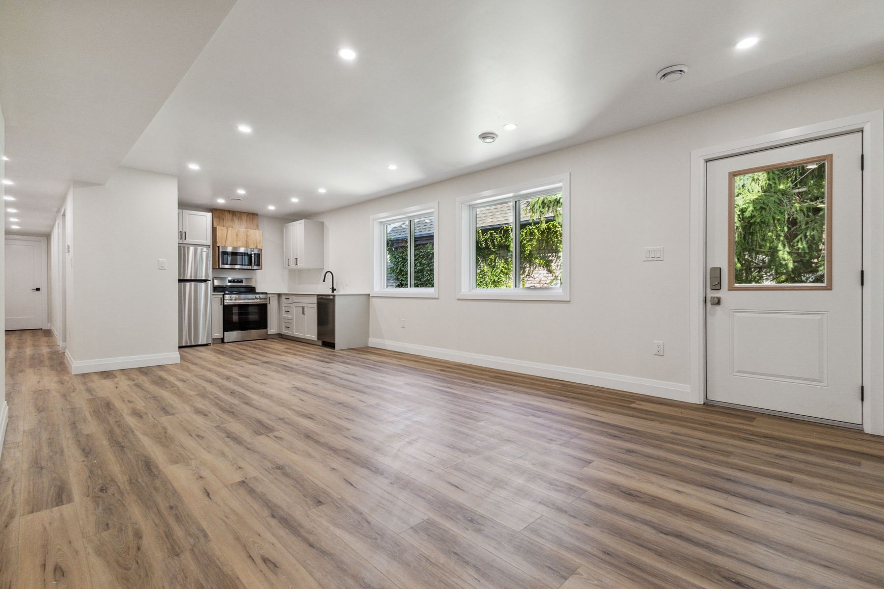 Open-concept living space and kitchen at 137 John St